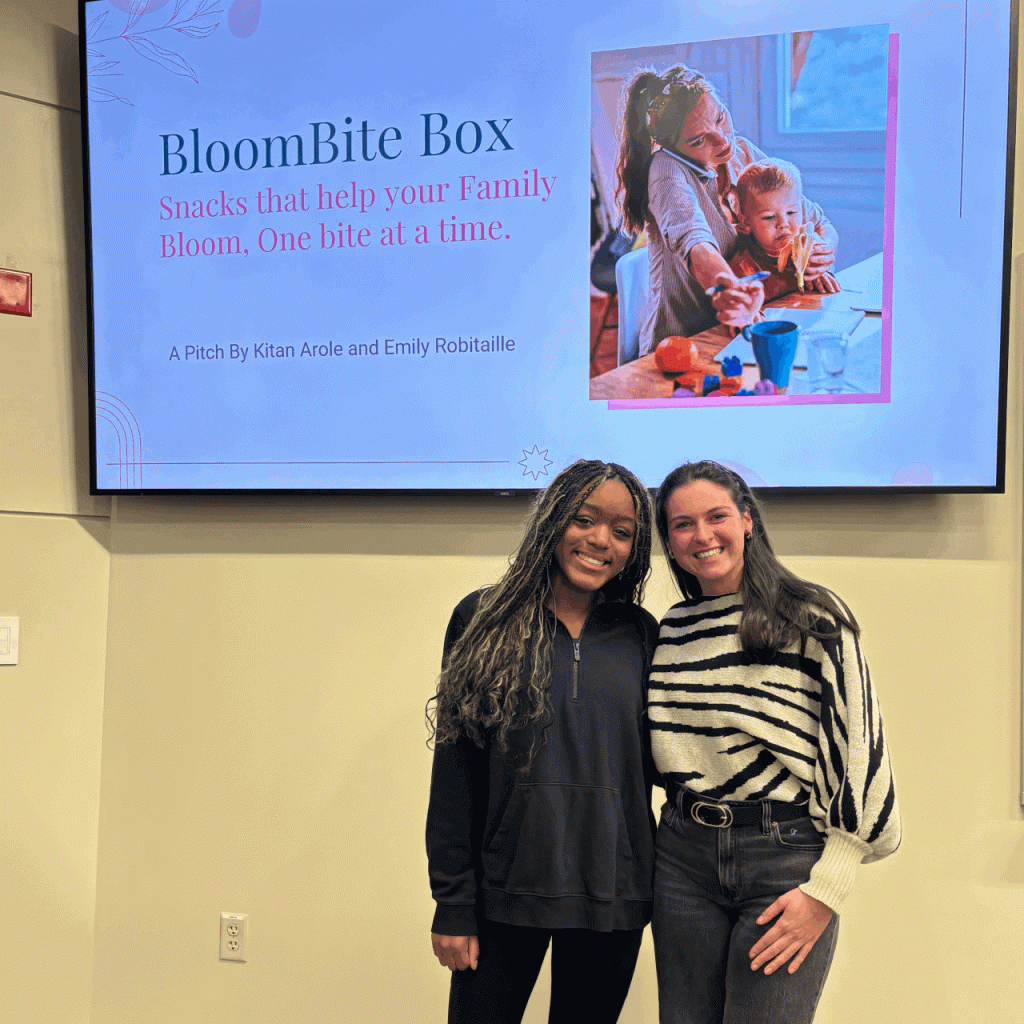 Fall 2025 Case Competition Winners featuring two students